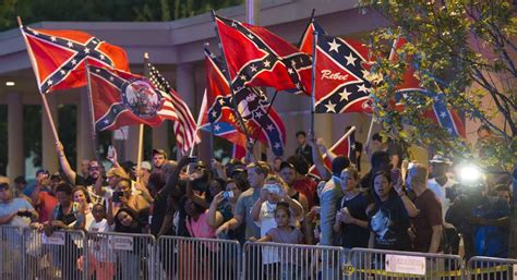 in oklahoma protesters greet obama with confederate flags politico