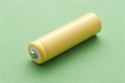 stock image  single yellow unlabelled battery sciencestockphotoscom