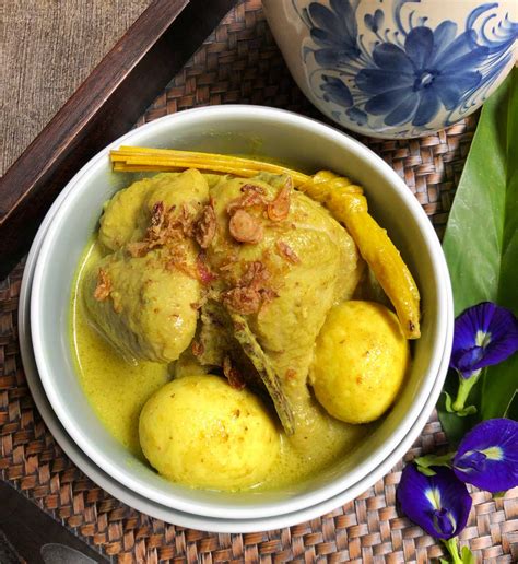 opor ayam kuning chicken  turmeric coconut milk cook  indonesian