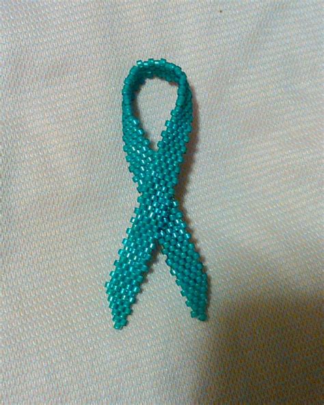 teal awareness ribbon beaded pin