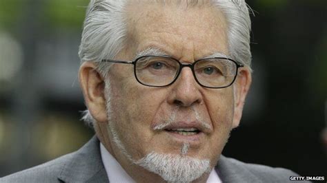 rolf harris experts divided over length of jail term bbc news