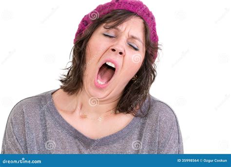 Exhausted Woman Covering Her Ears With A Duvet Royalty Free Stock Image