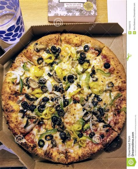 dominos pizza  vegetable toppings editorial photography image  dominos vegetable