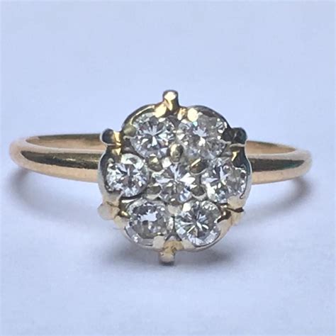 vintage diamond cluster ring  yellow gold floral design setting