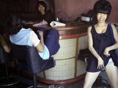 bar girls during the vietnam war in a candid color shots play vietnam