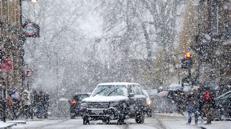 snow falls  icy uk causing treacherous conditions  travel warnings uk news sky news