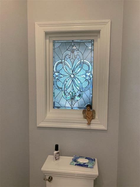 all clear beveled window installed in a client s bathroom