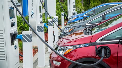ev turning point momentum builds   electric vehicle transition yale