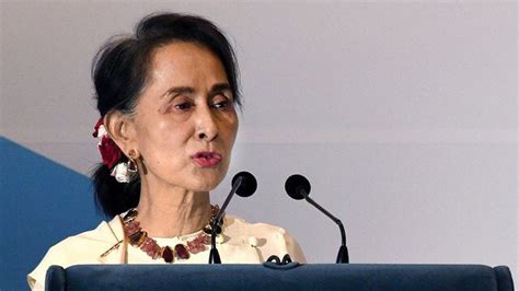 aung san suu kyi defends arrest of burmese journalists