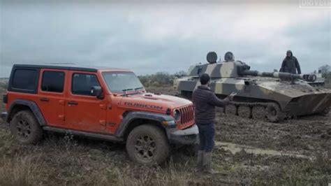Watch Jeep Wrangler Race Tank In Rough Off Road Conditions