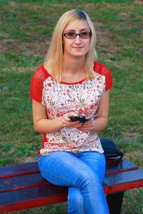 Cute Blonde Girl Texting Stock Image Image Of Outdoor 77051571