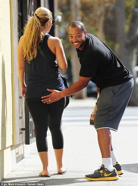 Donald Faison Gives Wife Cacee Cobb A Loving Pat On The Tummy While Out