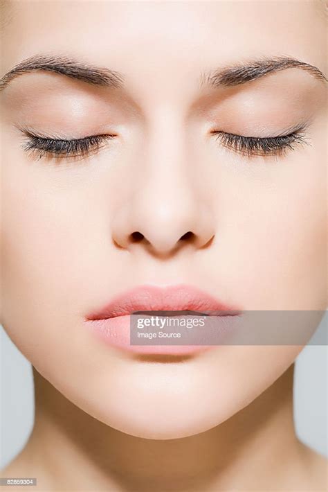 woman with eyes closed photo getty images