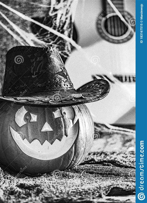 laughing pumpkin  cowboy hat stock image image  knife background