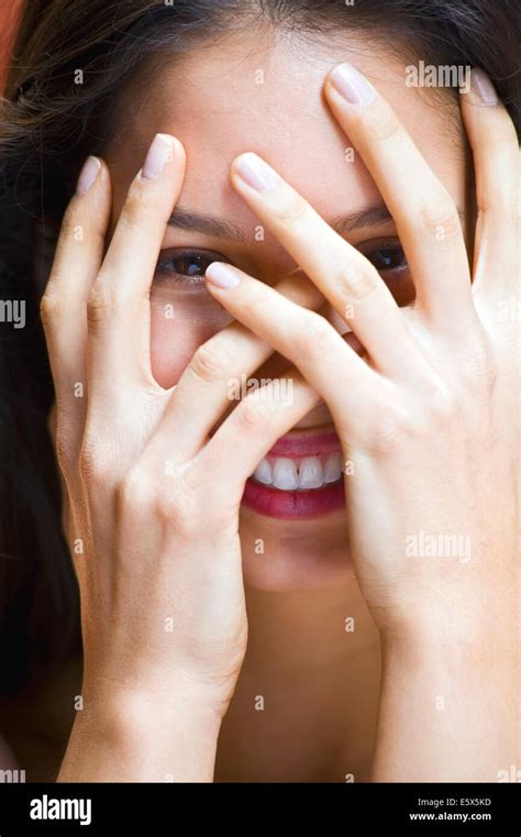 portrait  young woman  hands covering face stock photo alamy