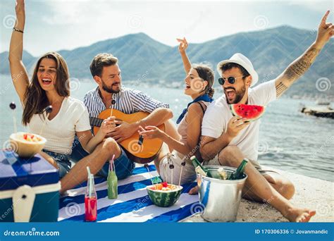 young people  fun  beach party stock photo image  happy