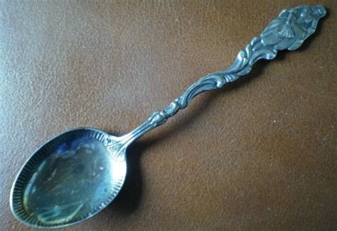 sweden souvenir spoon silverplate woman with fan 4in vintage swedish