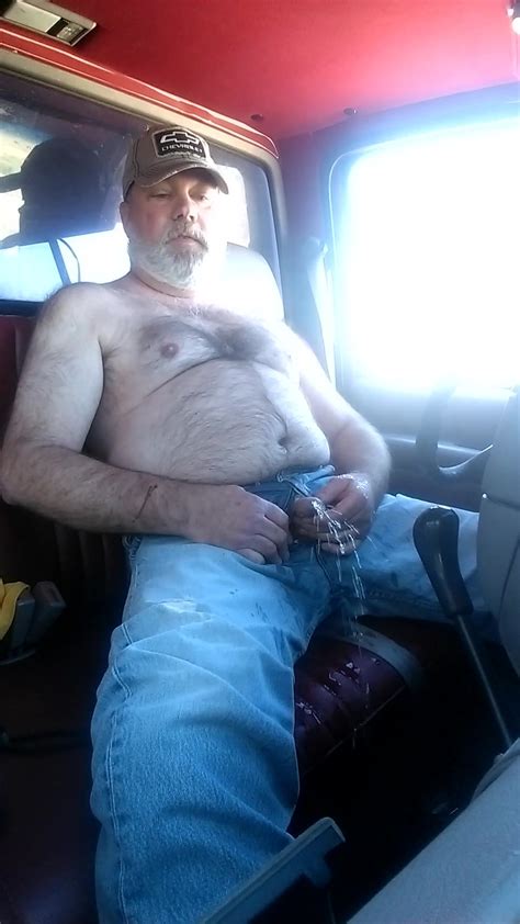 redneck daddy pissing in his truck