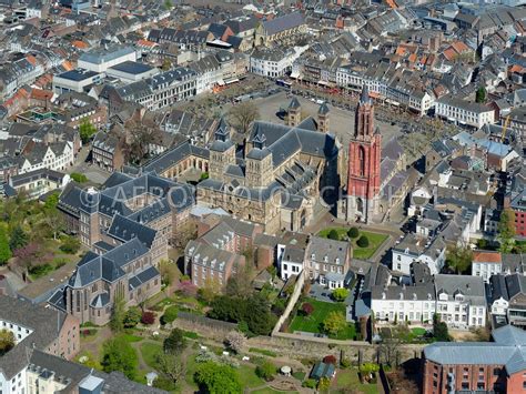 aerophotostock maastricht luchtfoto binnenstad met  de voorgrond de de stadsmuur