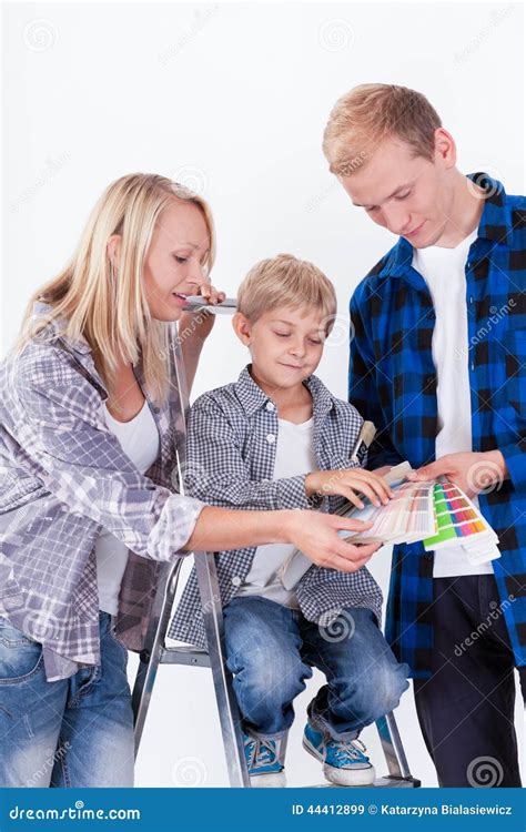 family choosing  color  painting wall stock image image  love