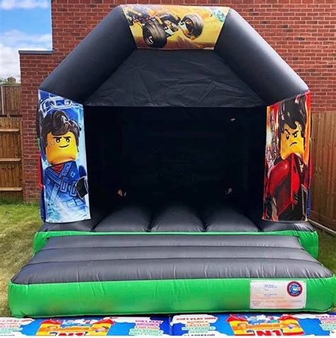 ninjago castle  inflatable fun bouncy castle hire soft play