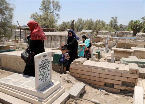 iraqi officials 14 bodies some with hands bound blindfolded found