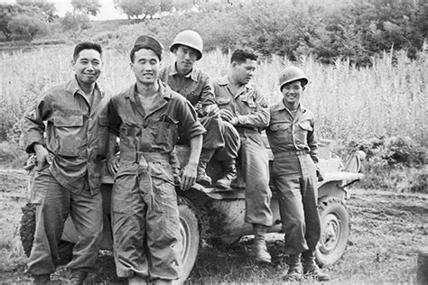 nisei soldiers japanese americans fought axis forces overseas  racial prejudice  home