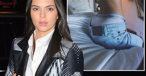 kendall jenner poses topless flashing her calvin kleins and a hint of