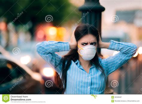 girl  mask covering  ears   noise pollution stock image image  girl