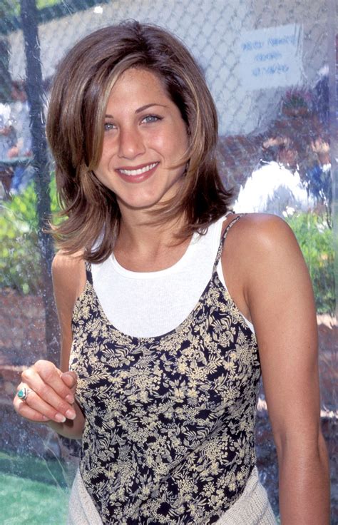 90s fashion trend sundresses with t shirts worn by jennifer aniston