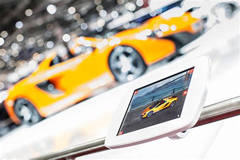 mclaren  app lets  put   super car    driveway