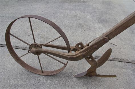 vintage single wheel farm garden push plow  fire fly workable condition