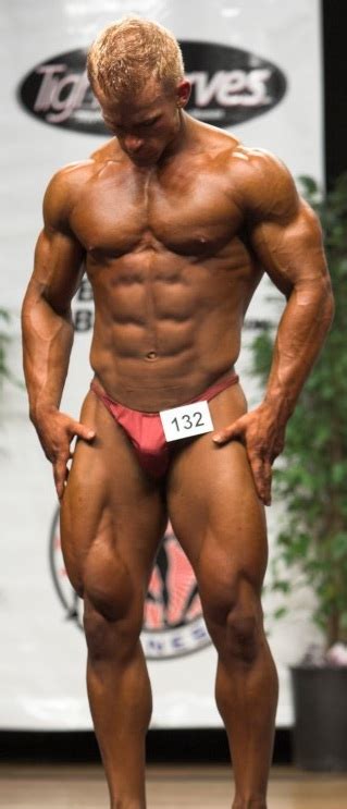 sexy muscle man male bodybuilder posing on stage 9 sexy