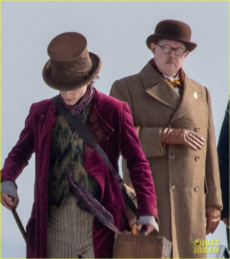 timothee chalamet spotted  full wonka costume  filming   beach photo