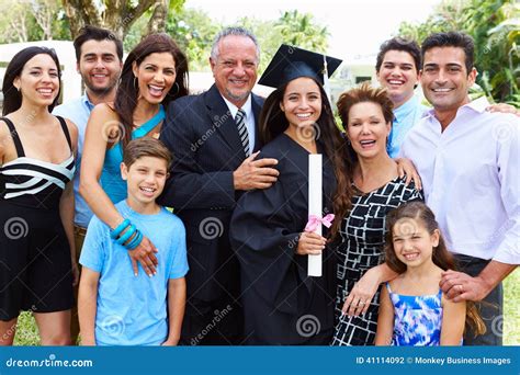 hispanic student  family celebrating graduation stock photo image
