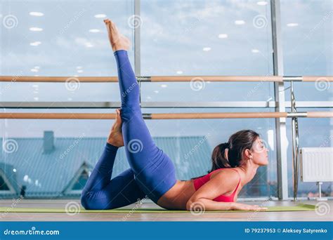 Young Woman Doing Yoga Exercises On Mat At Gym Stock Image Image Of