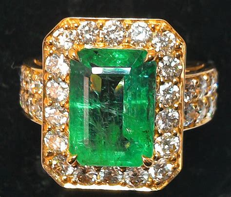 gouden ring met smaragd en diamanten catawiki