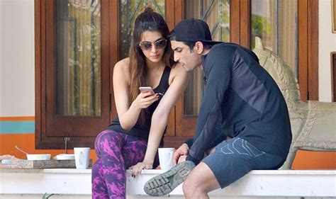[photos] even we want to know what s so interesting in sushant and kriti s phones