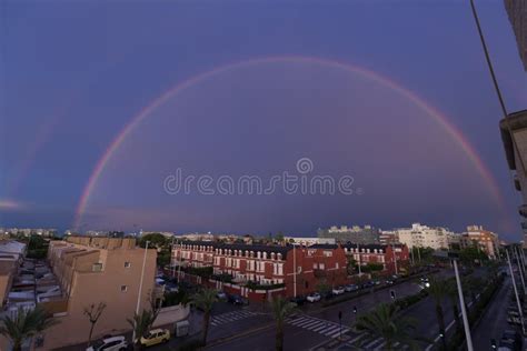 double rainbow   sky   city  elche  spain stock image image  green