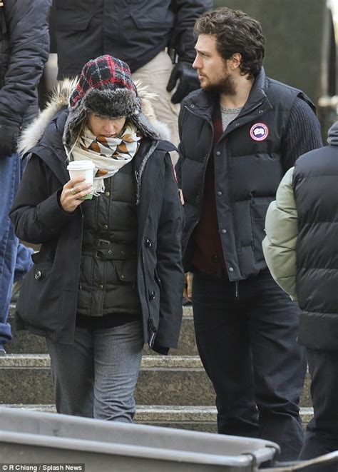 aaron taylor johnson 23 keeps wife sam 46 warm as he visits her on