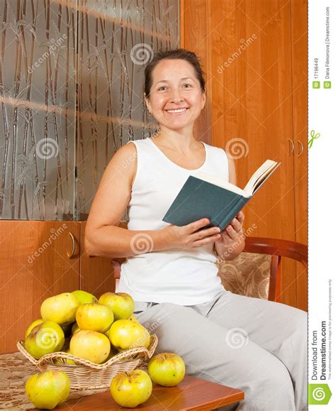 Mature Woman Reading Book Stock Image Image Of Apples
