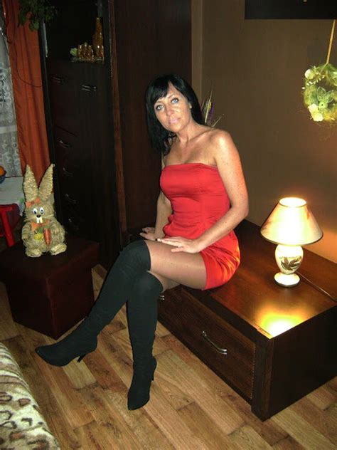 Yourateme Slim Brunette Woman In Red Minidress Shiny Tights And Black