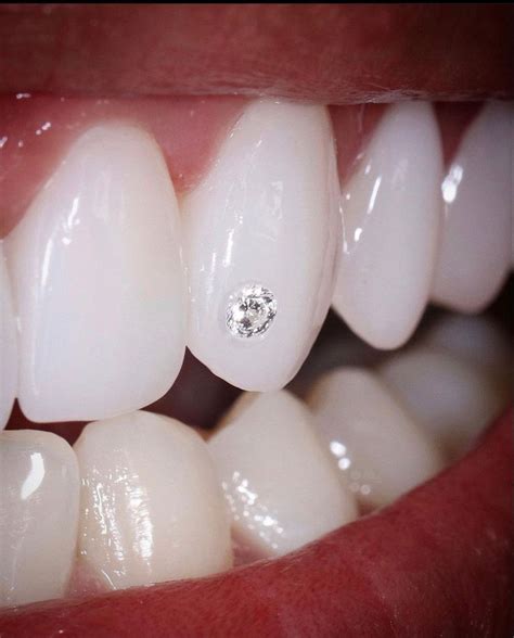 diamond drilled  canine teeth tooth gem gem nails teeth jewelry