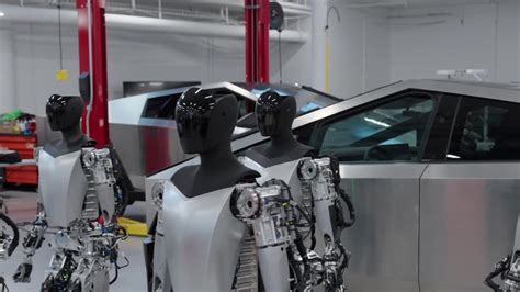 Rise Of The Tesla Bots Elon Musk Shows Off Terminator Like Optimus