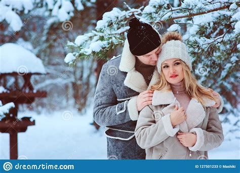 Winter Portrait Of Happy Romantic Couple Enjoying Their