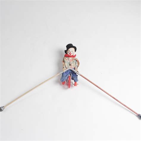 vintage toy clown tight rope walker ebth