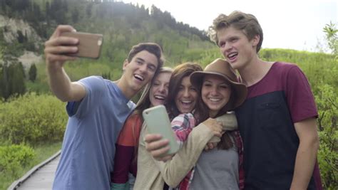 group of fun teens on stock footage video 100 royalty free 10741604 shutterstock