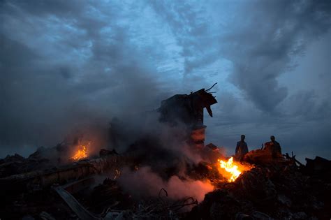 jetliner explodes  ukraine struck  missile officials    york times