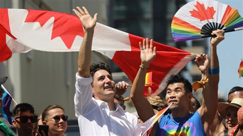 crowds gather as massive pride parade takes over downtown toronto