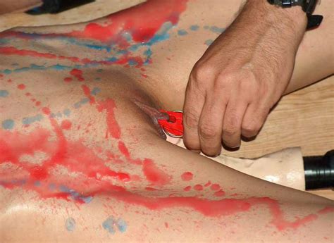 asian girl in colored wax play torture bdsm photos